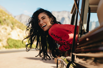 Woman having a great time on road trip