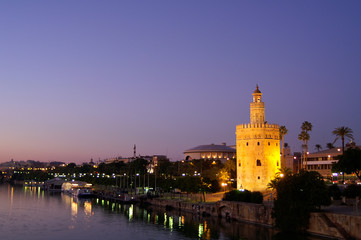 Fototapeta na wymiar Seville (Spain). Night view of the Torre del Oro in the city of Seville