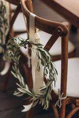 Boho wedding chair with eco decor for guests.