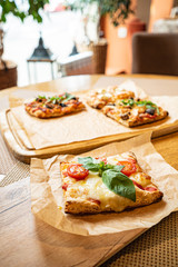 slice of italian pizza in the pizzeria
