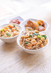 Braised shrimp over rice - Taiwan famous traditional street food. Soy-stewed prawn on cooked rice. Travel concept, top view, copy space, close up