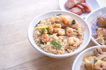 Braised shrimp over rice - Taiwan famous traditional street food. Soy-stewed prawn on cooked rice. Travel concept, top view, copy space, close up