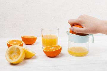 Making of citrus juice with squeezer
