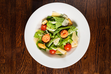 caesar salad with salmon fish