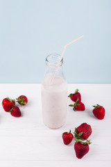 Strawberry smoothie with yogurt in bottle