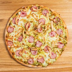 pizza on the wooden backgroun