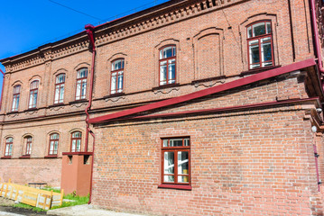 Fototapeta na wymiar lesosibirsk / Russia - june 06 2019: old wooden houses with carved Windows. Small town. Village