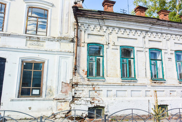 lesosibirsk / Russia - june 06 2019: old wooden houses with carved Windows. Small town. Village