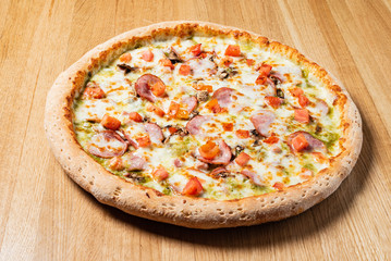 italian pizza on the wooden background