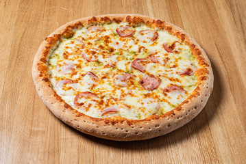 italian pizza on the wooden background