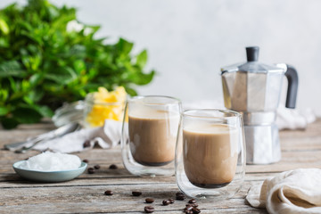 Keto, ketogenic bulletproof coffee with coconut oil and ghee butter