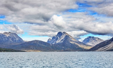 Fototapeta na wymiar Landscape Greenland, beautiful Nuuk fjord, ocean with mountains background