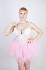 Naklejka premium plus size woman in white pink ballerina dress 