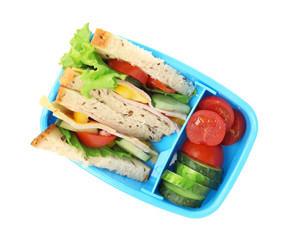 School lunch box with tasty food on white background
