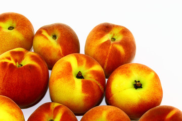 Naklejka na ściany i meble Ten peaches are fresh and ripe on a white background
