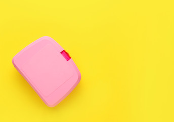 Plastic lunch box on color background