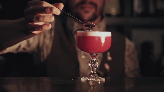 Barman make a cocktail