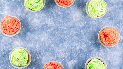 Tasty colorful cupcakes closeup with copy space. Birthday party sweets. Happy birthday greeting card
