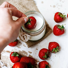 Fresh strawberries on a Rustic background. Top view.