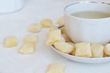 little candies and a Cup of tea