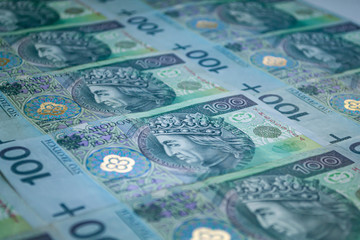 Polish currency. One hundred zloty banknotes. Macro photo