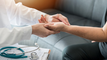 Elderly patient pulse check by medical geriatric doctor awaring of stroke, high boold pressure,...