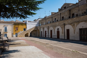 Empty square in a hot summer day. Poggiorsini, Apulia region, Italy