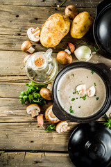 Homemade mushroom soup, old wooden background copy space