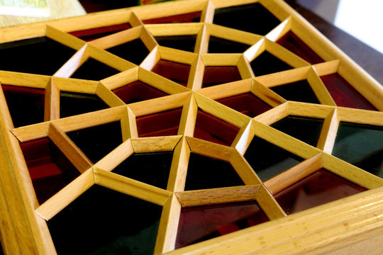 Traditional Azerbaijan handmade ornament called shebeke. Oriental ornaments lattice made of wood. Background islamic ornaments