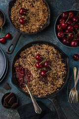cherry and chocolate crumble pie on cast iron pan