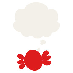 cartoon wrapped candy and thought bubble in retro style