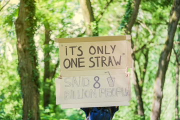 poster with slogan to save the planet with out using plastic straw