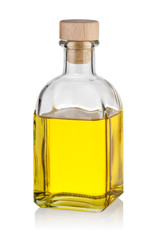 Bottle of yellow oil with cap
