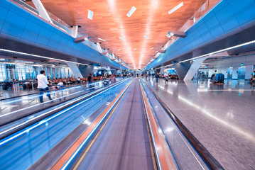 DOHA, QATAR - AUGUST 17, 2018: Interior of Hamad International Airport. It is a major hub to...