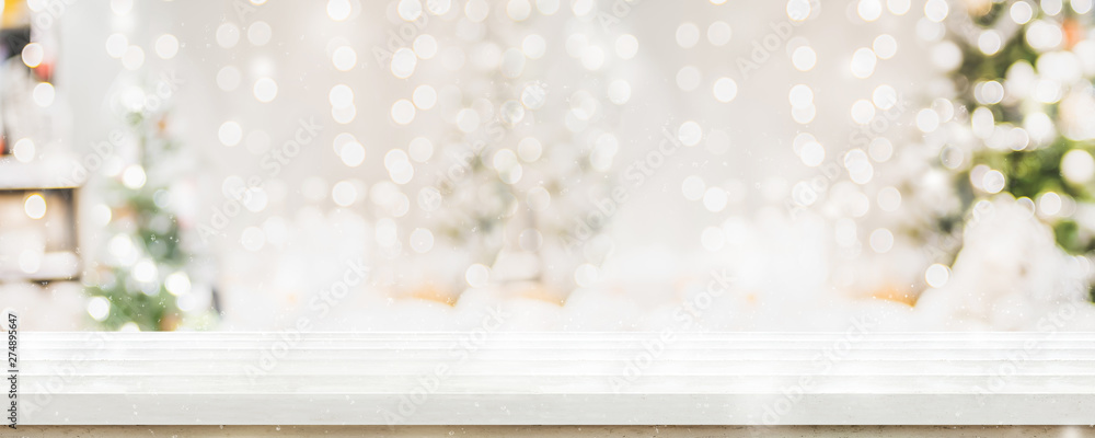 Fototapete empty white wold table top with abstract warm living room decor with christmas tree string light blu