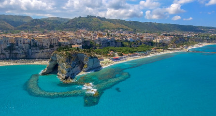 Obraz na płótnie Canvas Panoramic aerial view of Tropea coastline and beaches in summer, Calabria - Italy