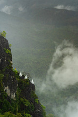 Chaloem Phra Kiat Temple, Pagoda on the mountain in the mist,Thailand