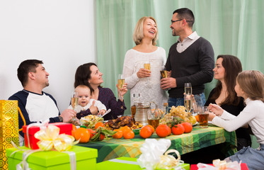 Children, parents and grandparents togethe congratulating