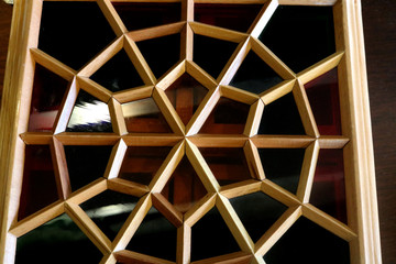 Traditional Azerbaijan handmade ornament called shebeke. Oriental ornaments lattice made of wood. Background islamic ornaments