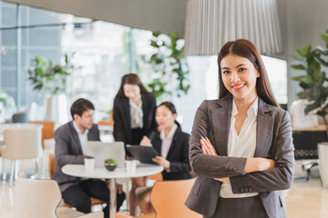 Portrait group of Asian business people in formal suit in working office