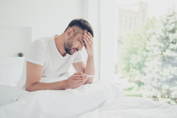 Close up side profile photo amazing he him his unhappy guy hold thermometer terrible hurt pain...