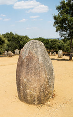 Megalith in arid field - Cromlech di Almendres - Evora, Portugal