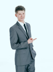 young businessman pointing at a copy space.