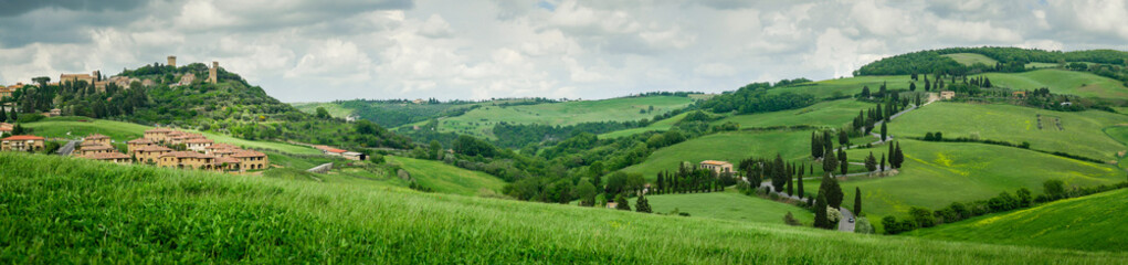Cypress road near small village of Monticchiello, Tuscany, Italy