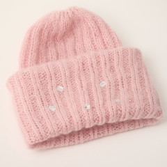 Close shot of cold weather winter handmade knitting clothes