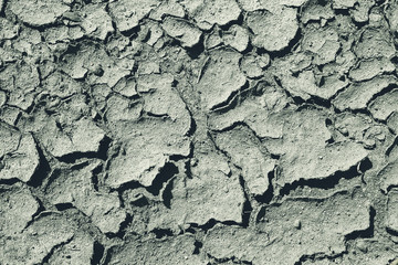 Textured friable dry sand. Cracks in the sand. Old sandy surface