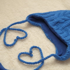 Close shot of cold weather winter handmade knitting clothes