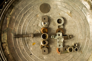 rusty bolts and nuts tools on background