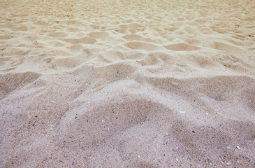 Fine beach sand in the summer sun
