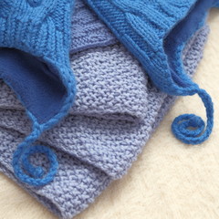 Close shot of cold weather winter handmade knitting clothes